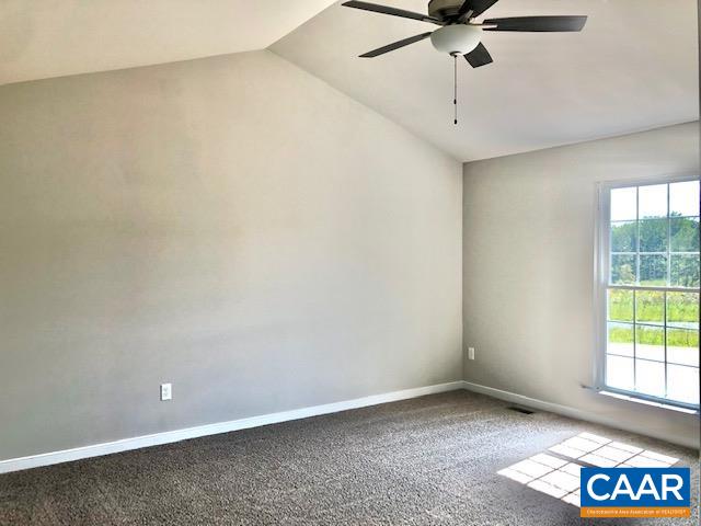 197 Riva Way Palmyra, VA 22963 - Photo 18 of 33 an empty room with a window and a fan