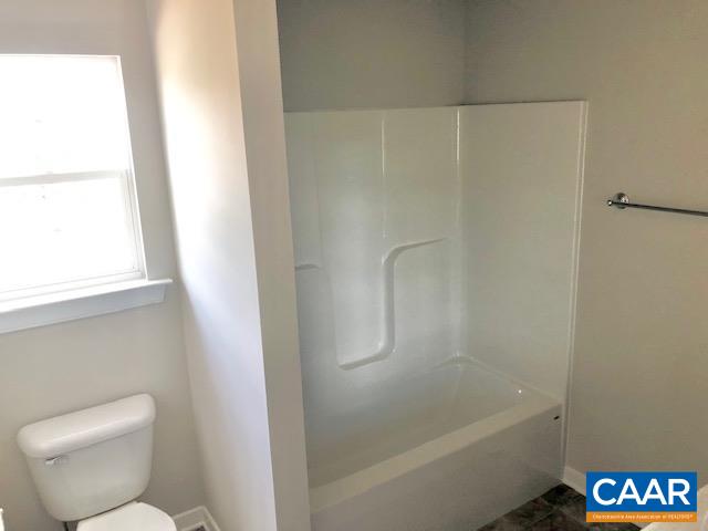 197 Riva Way Palmyra, VA 22963 - Photo 26 of 33 a bathroom with a toilet and a bathtub