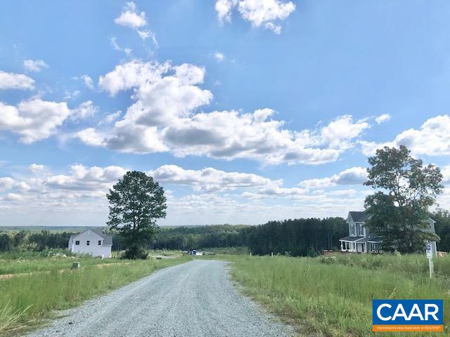 197 Riva Way Palmyra, VA 22963 - Photo 33 of 33 a view of a lake with a big yard