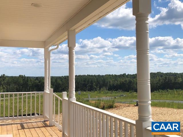 197 Riva Way Palmyra, VA 22963 - Photo 4 of 33 a view of a balcony with lake view and wooden floor