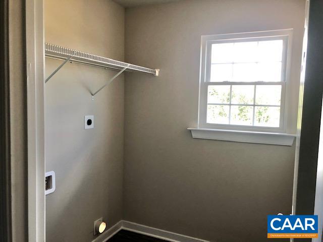 197 Riva Way Palmyra, VA 22963 - Photo 10 of 33 a view of a room with rack on the wall and a window