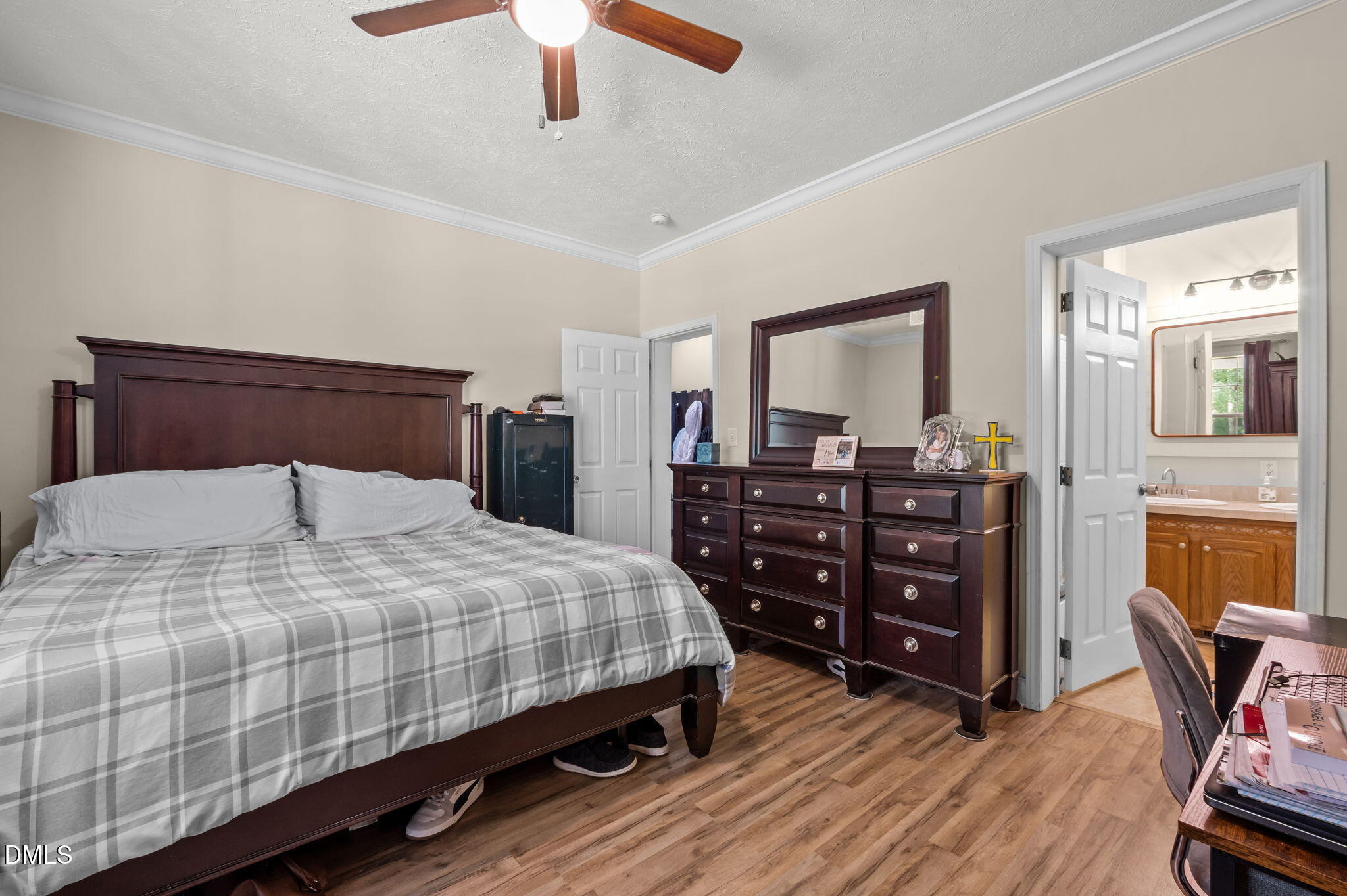 129 Family Drive Rougemont, NC 27572 - Photo 14 of 37 a bedroom with a bed and wooden floor