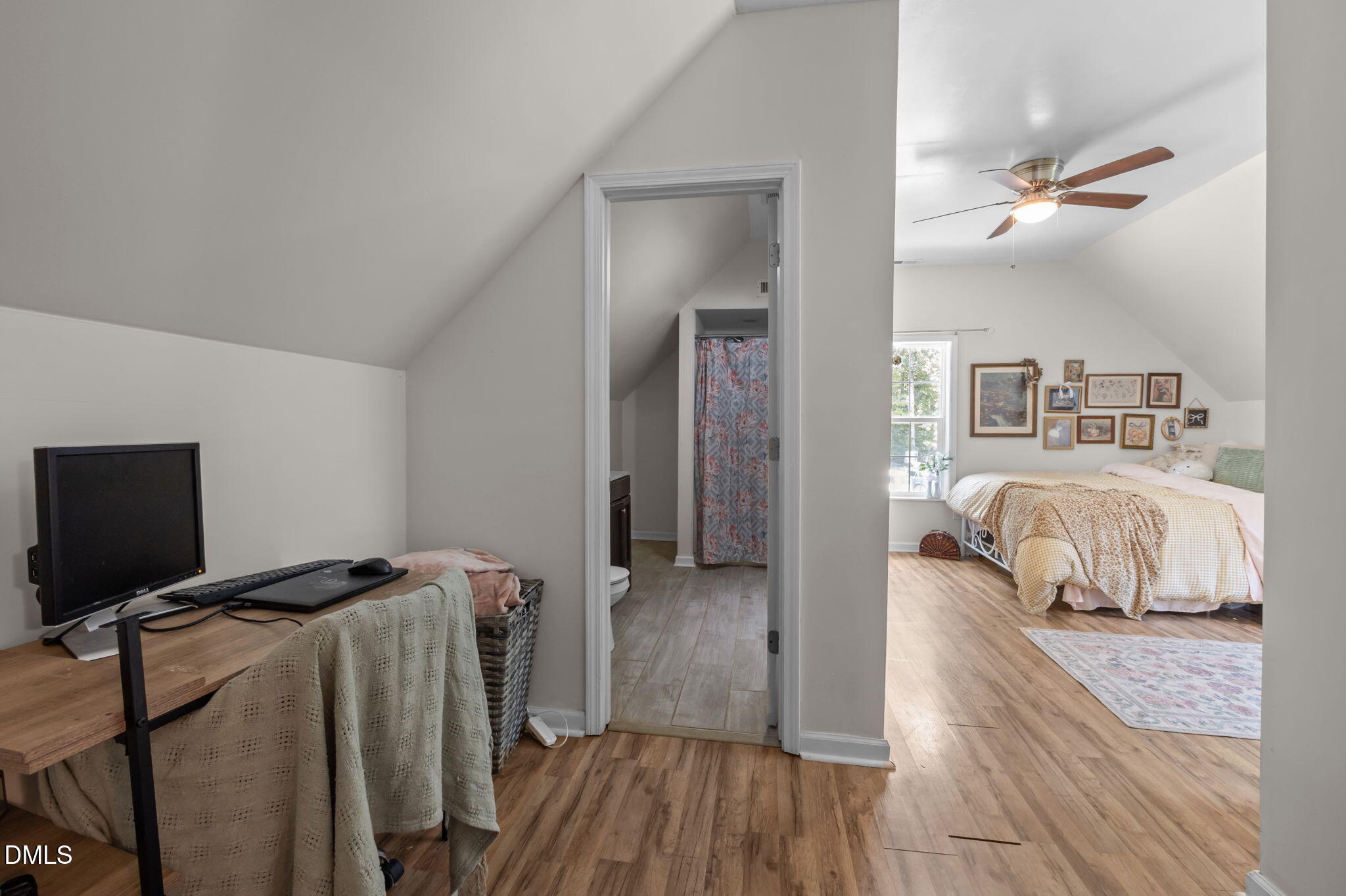 129 Family Drive Rougemont, NC 27572 - Photo 22 of 37 a bedroom with a bed and a flat tv screen