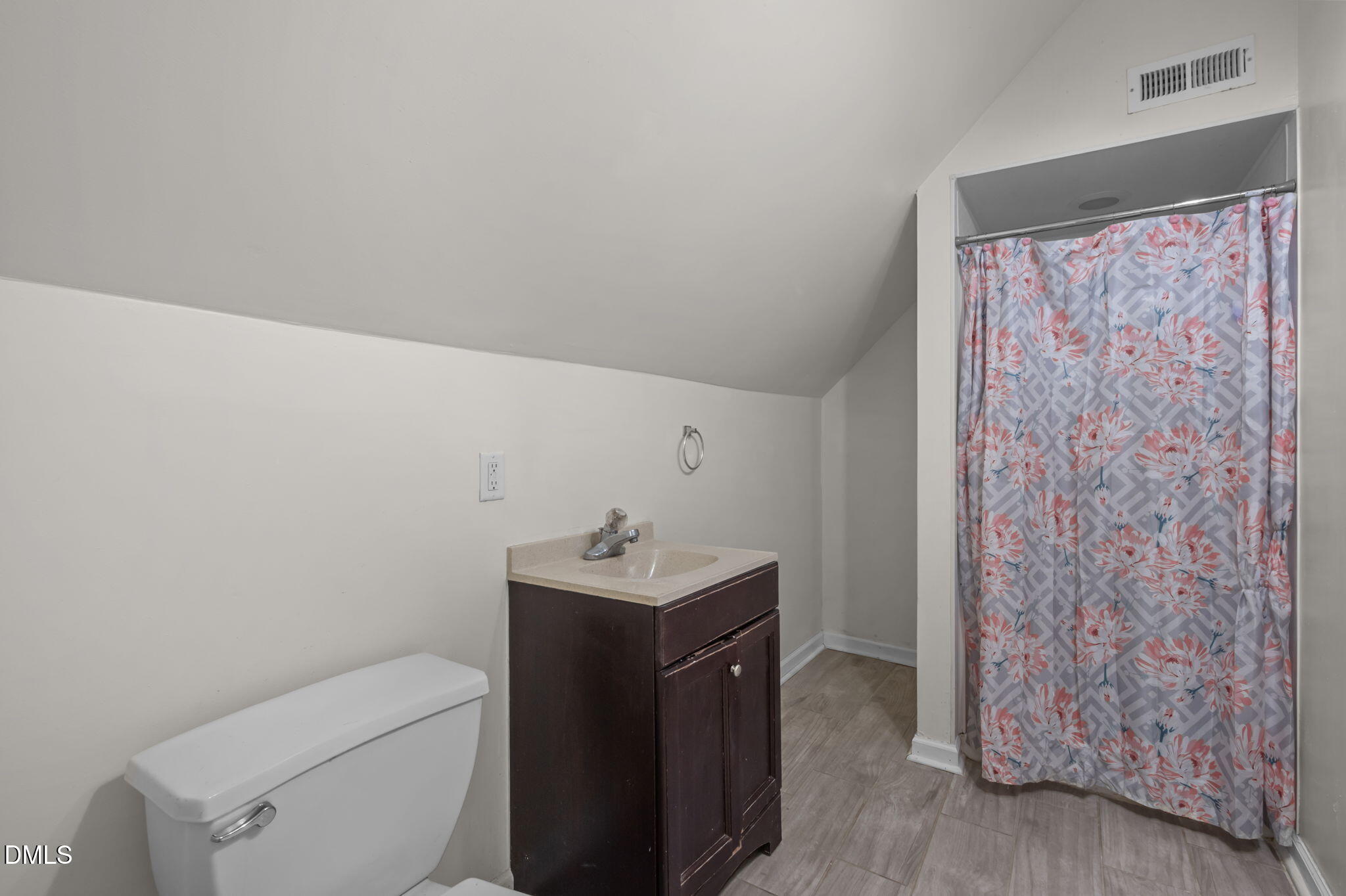 129 Family Drive Rougemont, NC 27572 - Photo 23 of 37 a utility room with a toilet sink and a mirror