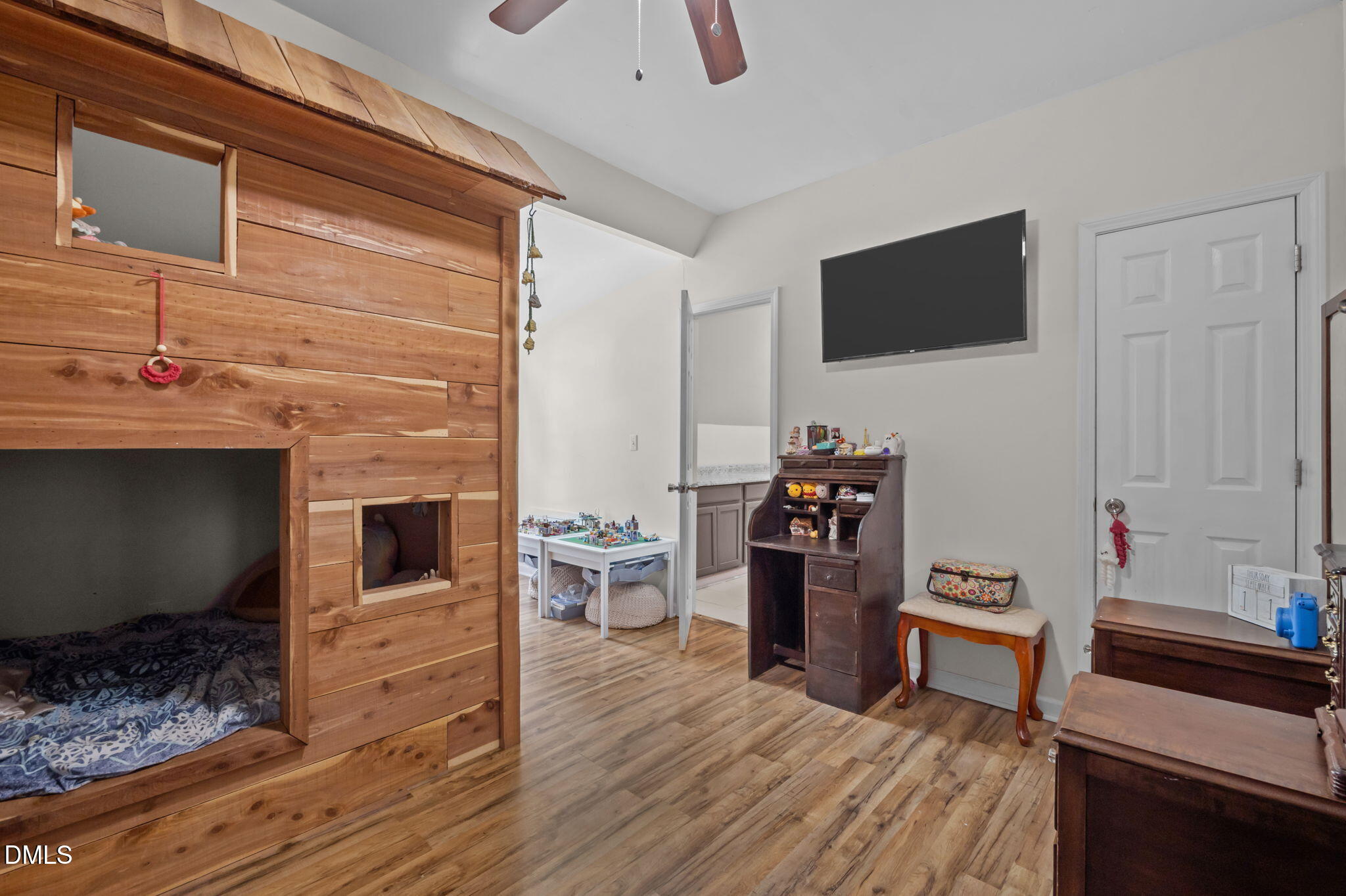 129 Family Drive Rougemont, NC 27572 - Photo 26 of 37 a living room with furniture and a flat screen tv