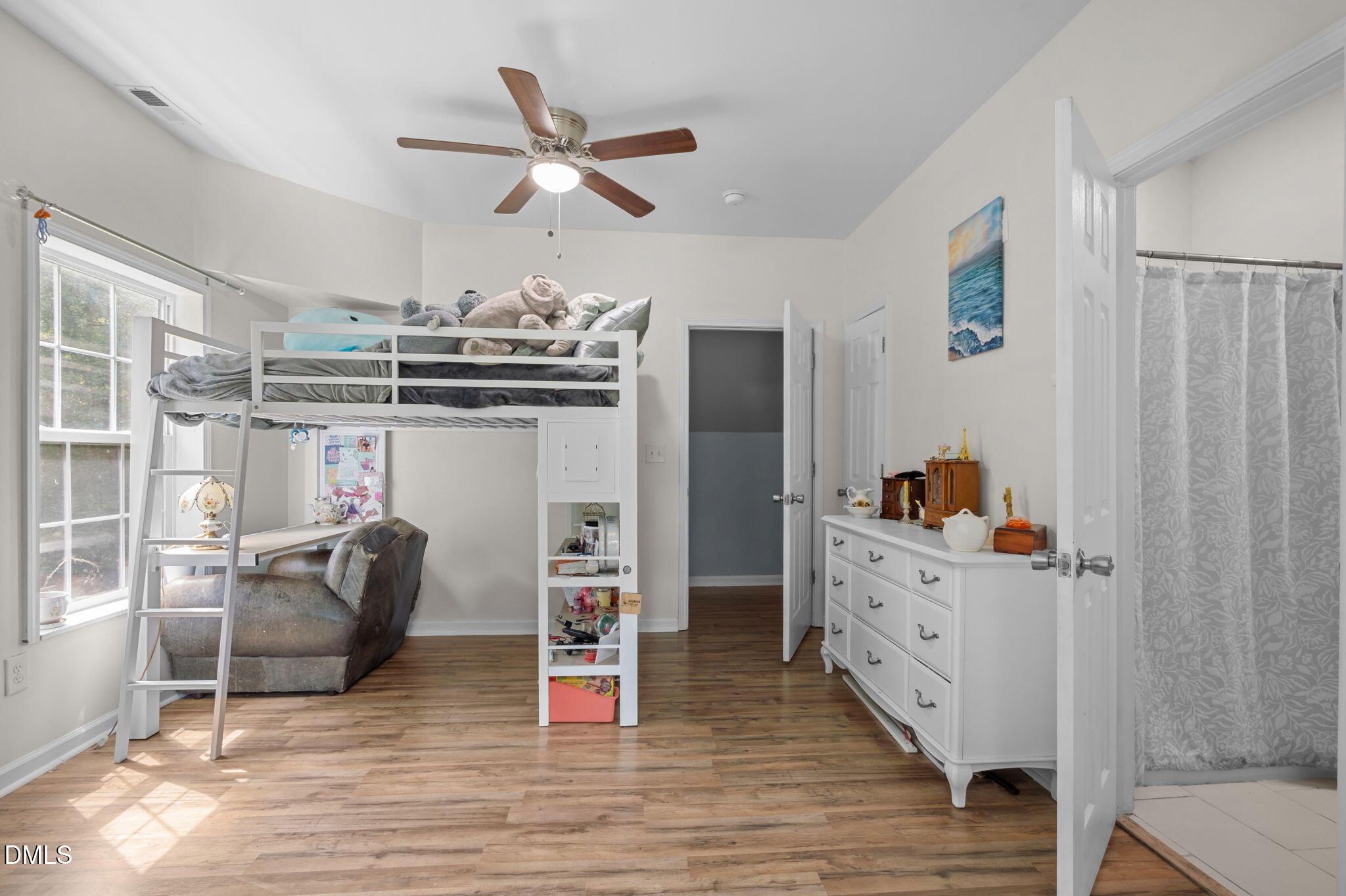 129 Family Drive Rougemont, NC 27572 - Photo 28 of 37 a living room with furniture and a wooden floor
