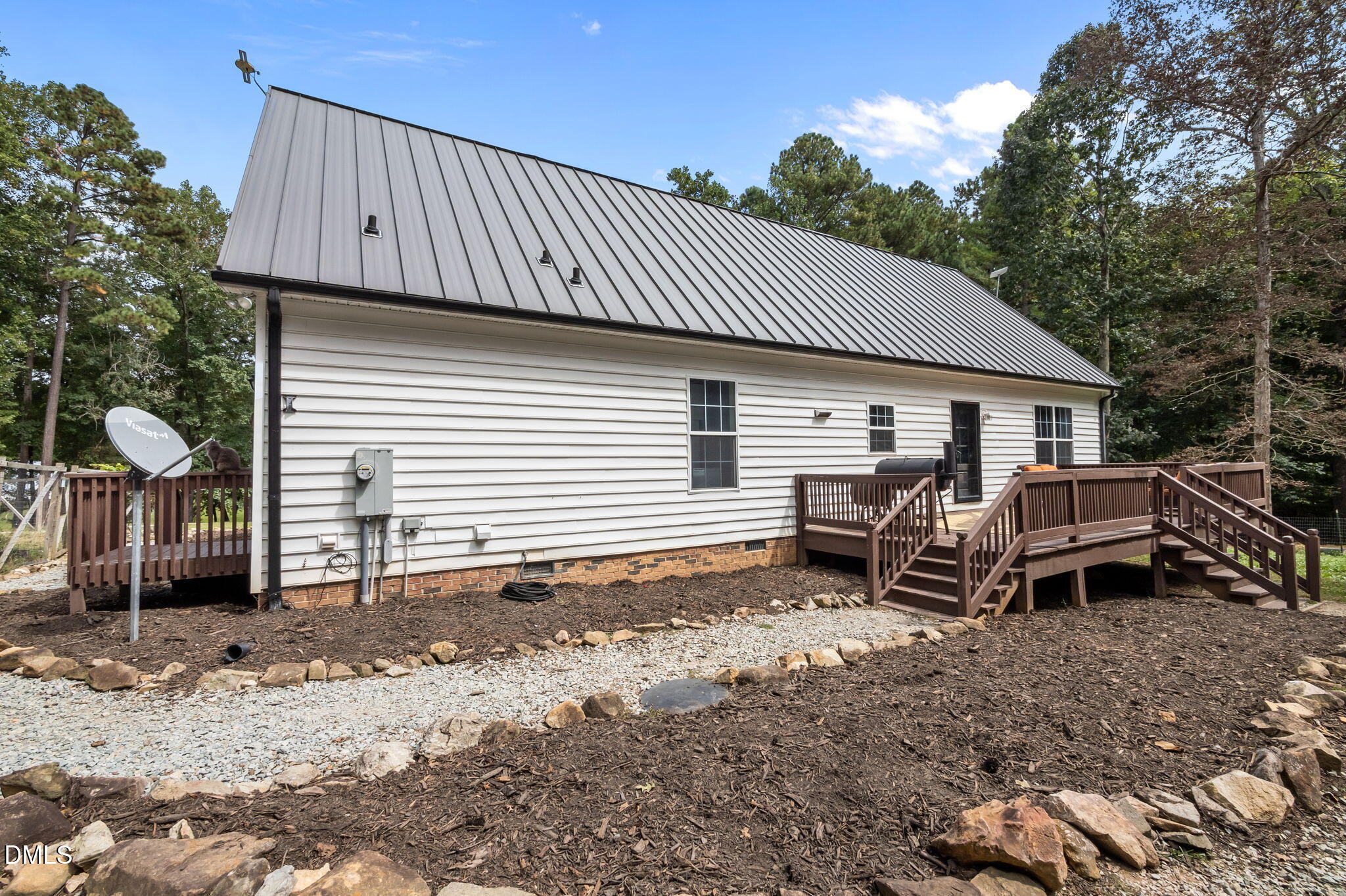 129 Family Drive Rougemont, NC 27572 - Photo 30 of 37 a view of a house with a patio and a yard