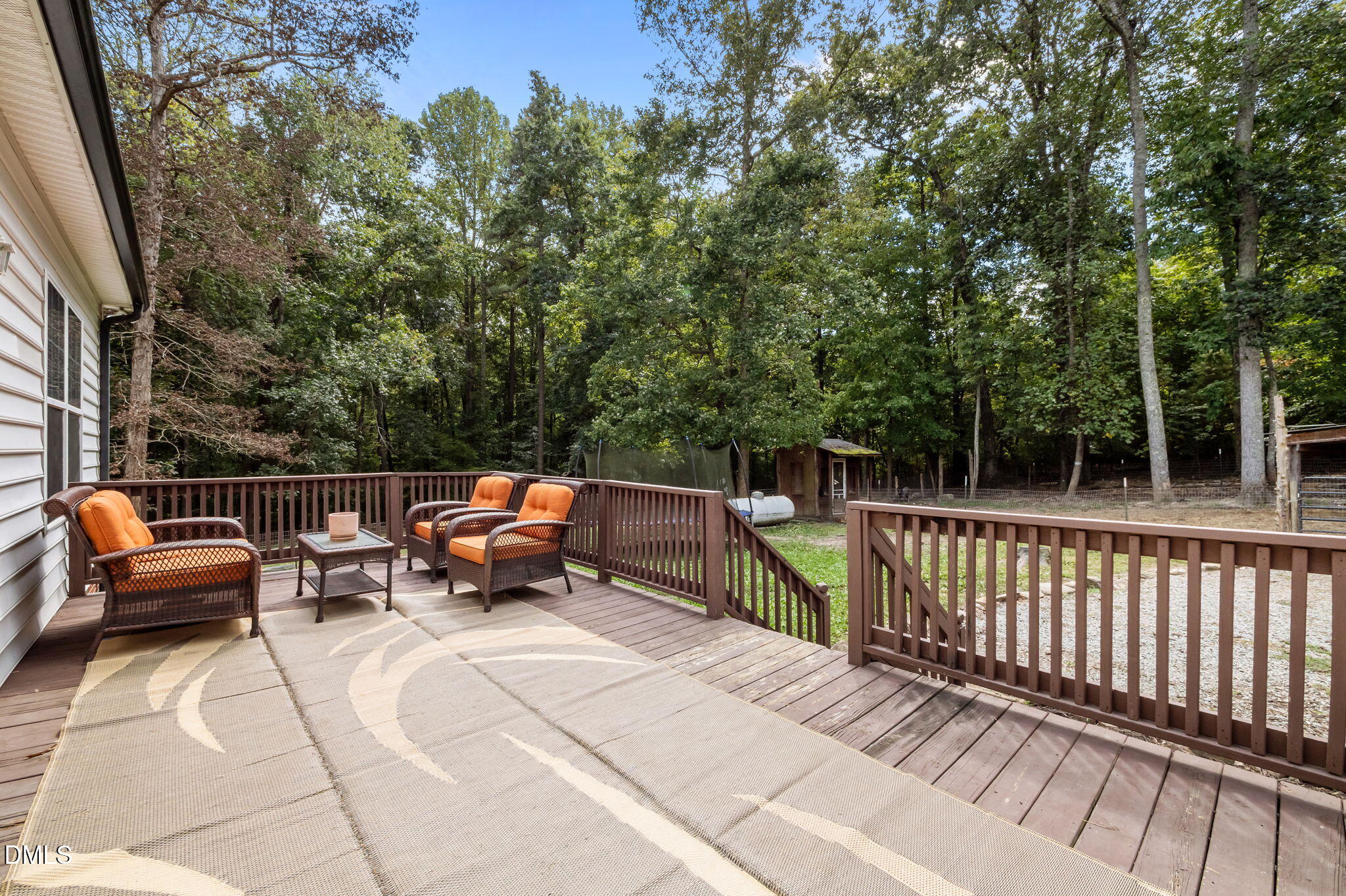 129 Family Drive Rougemont, NC 27572 - Photo 31 of 37 a roof deck with couches and wooden fence