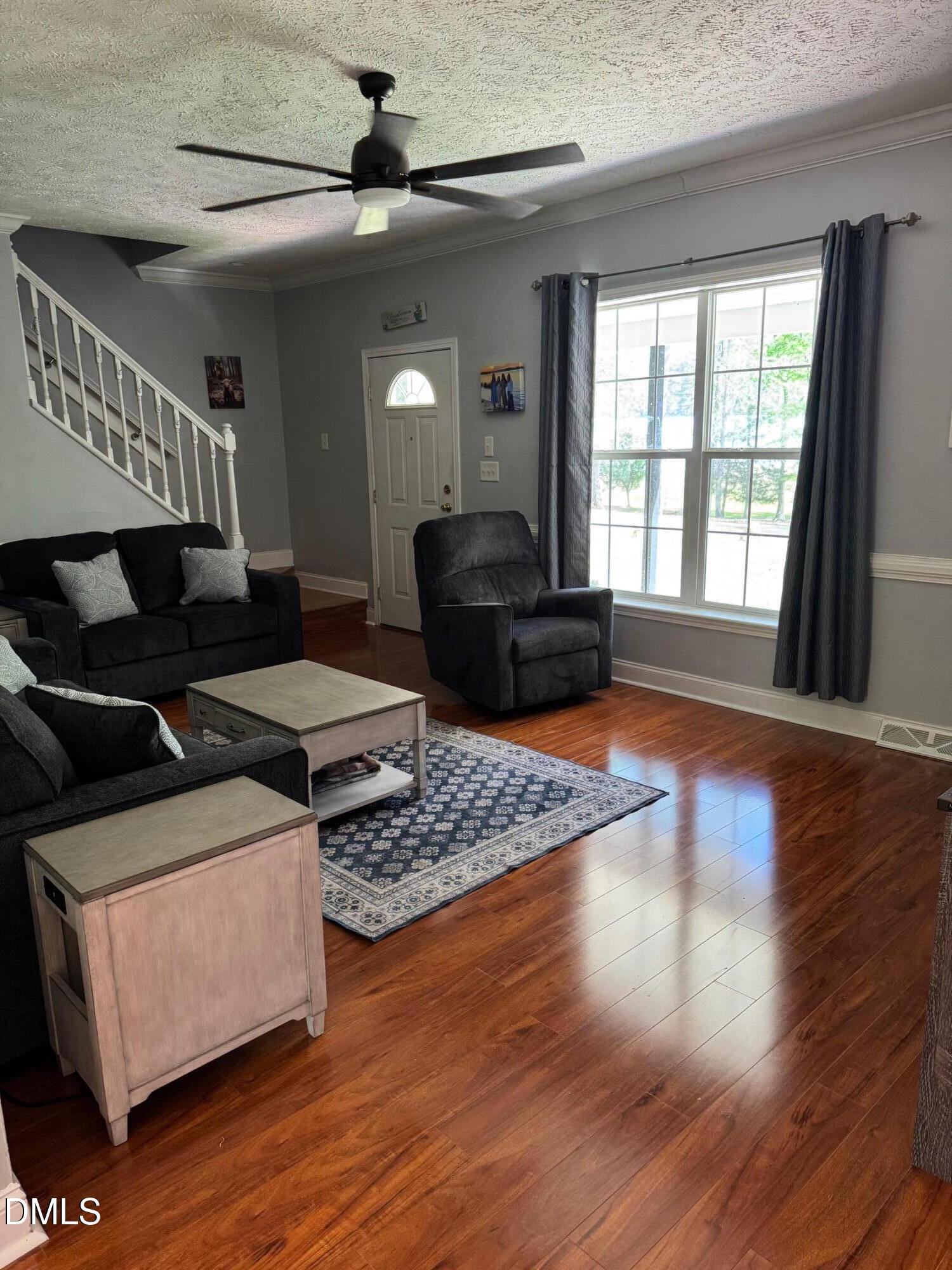 129 Family Drive Rougemont, NC 27572 - Photo 36 of 37 a living room with furniture and a window
