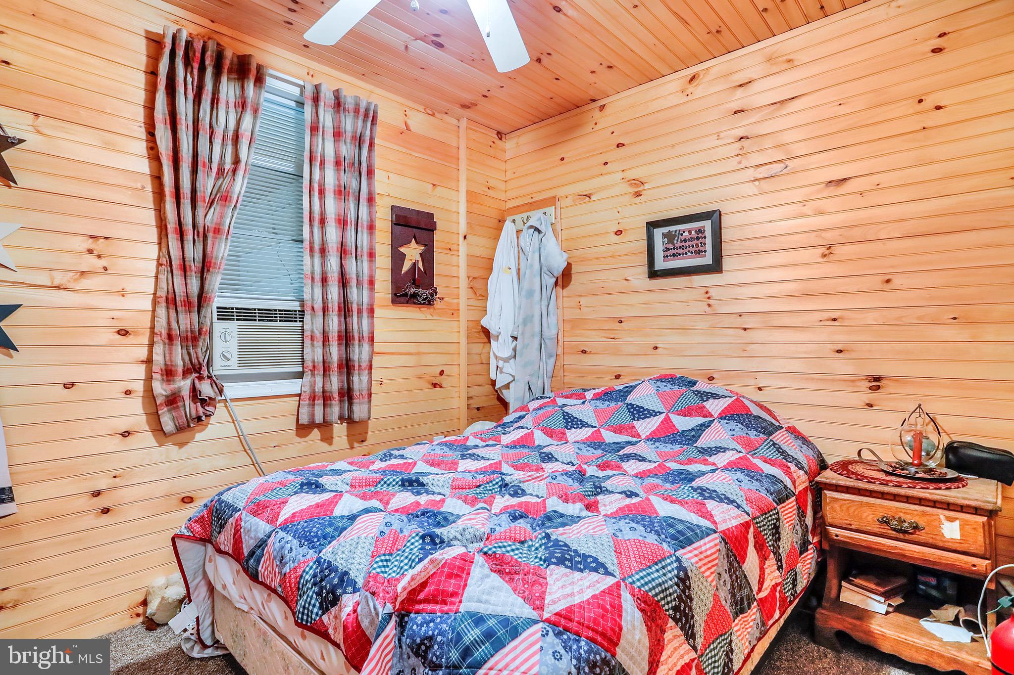 25-20 Rocky Road Falling Waters, WV 25419 - Photo 12 of 25 a bedroom with a bed and a dresser