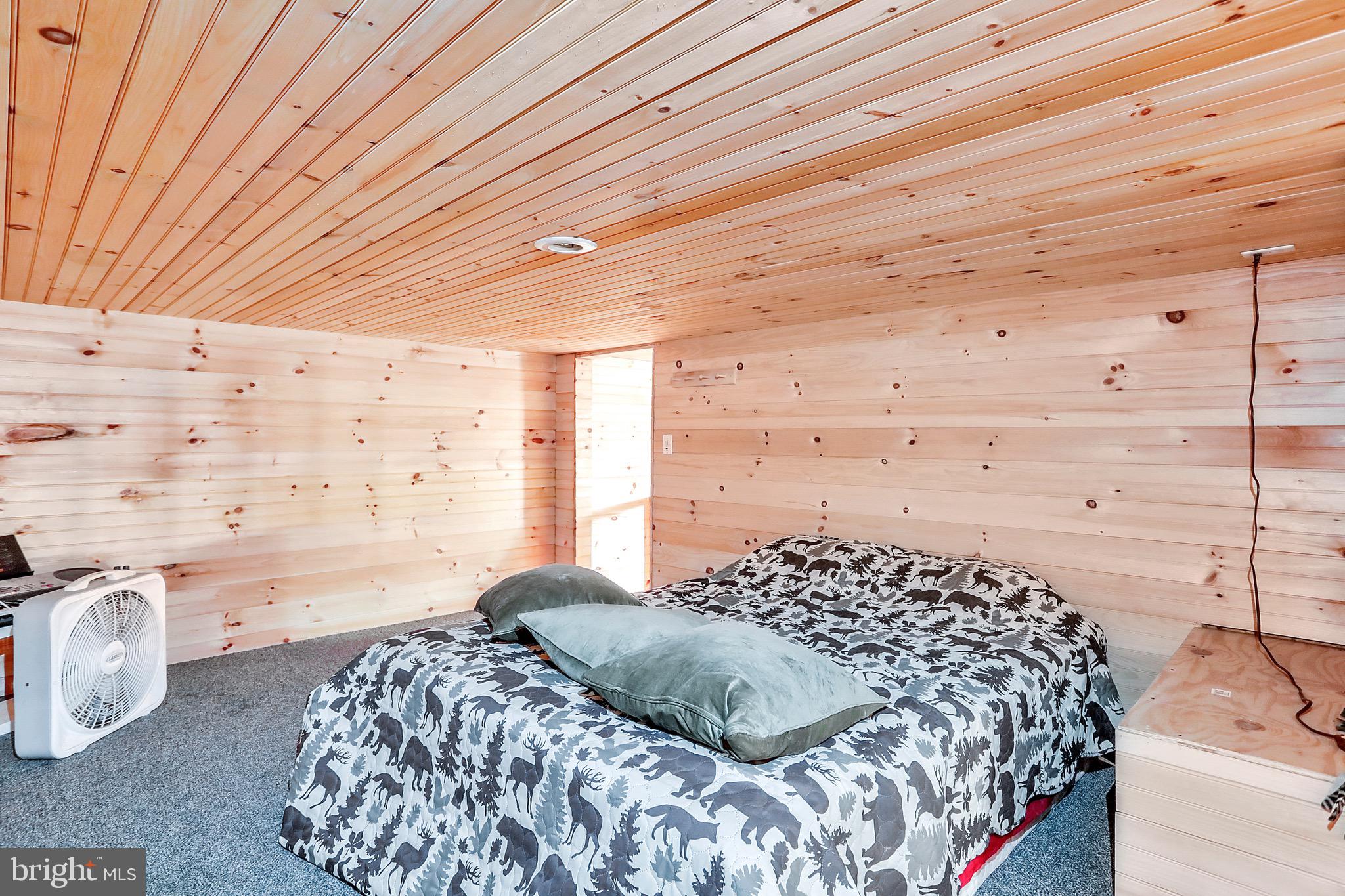 25-20 Rocky Road Falling Waters, WV 25419 - Photo 14 of 25 a bedroom with a bed and a window