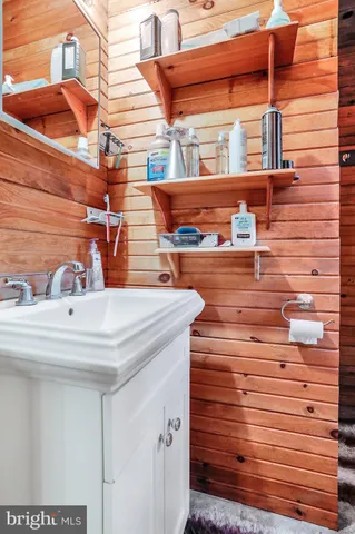 a view of a wooden chairs on the wall
