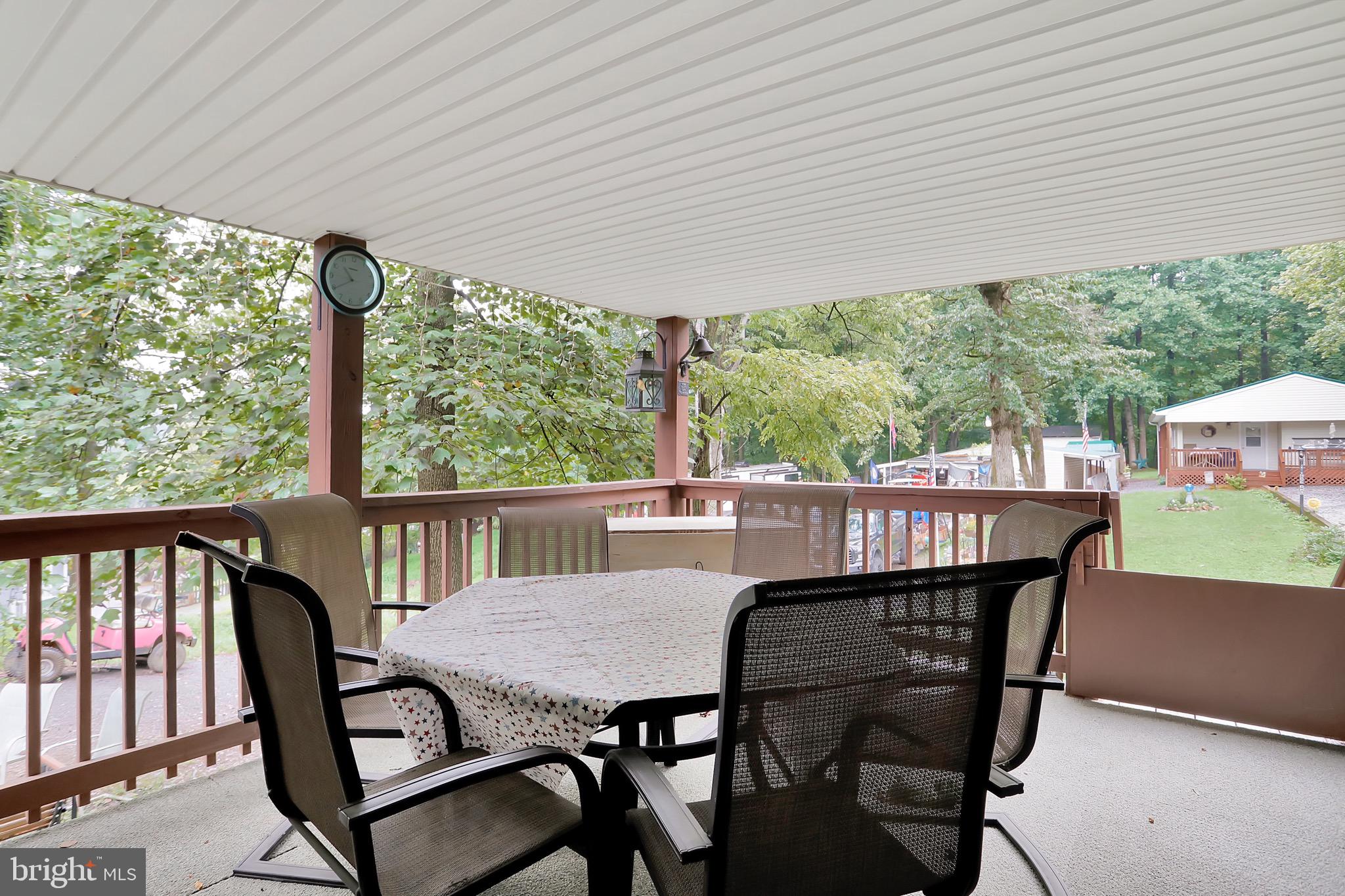 25-20 Rocky Road Falling Waters, WV 25419 - Photo 19 of 25 a view of a dining room with furniture window and outside view