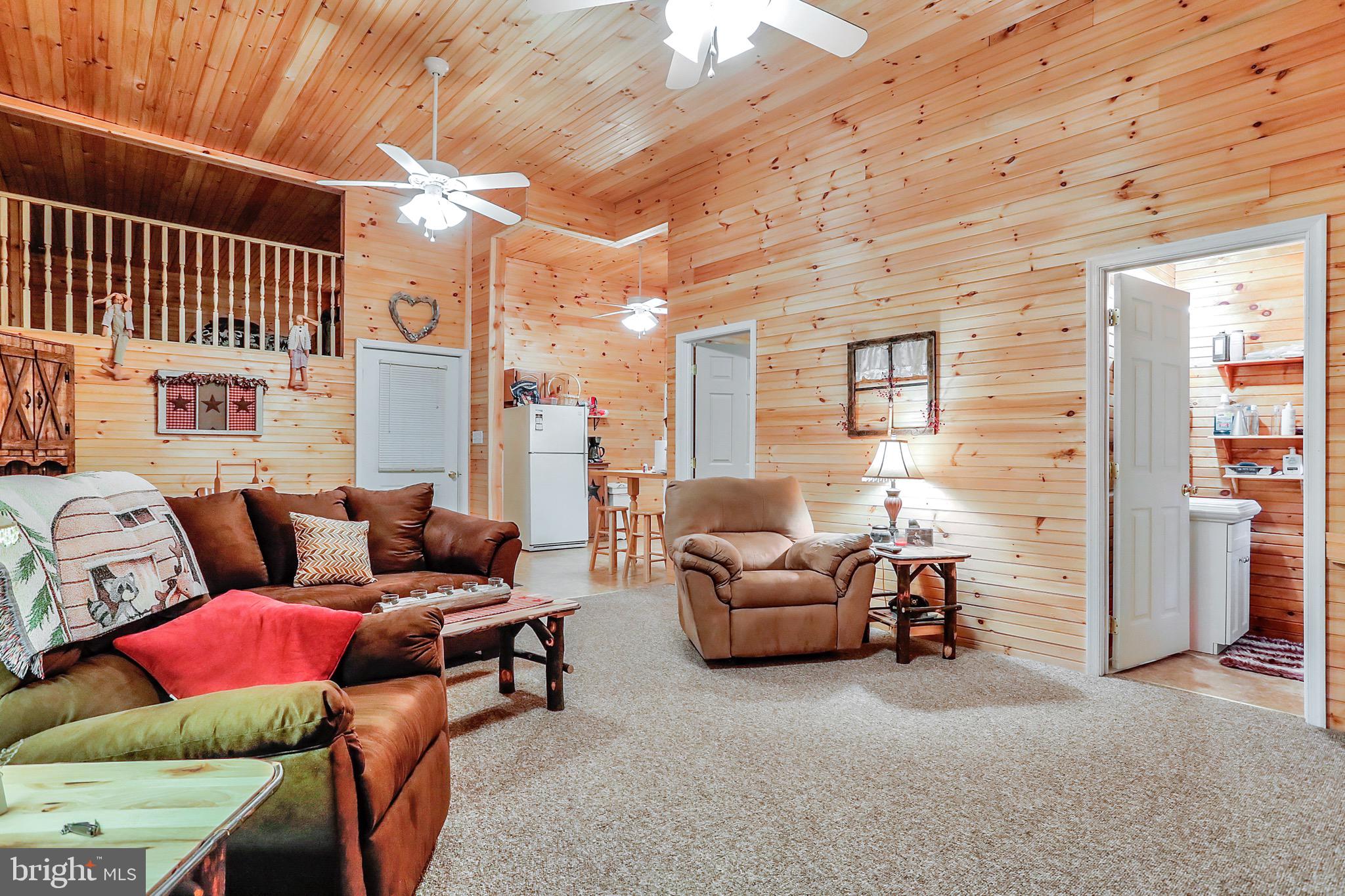 25-20 Rocky Road Falling Waters, WV 25419 - Photo 4 of 25 a living room with furniture and a window