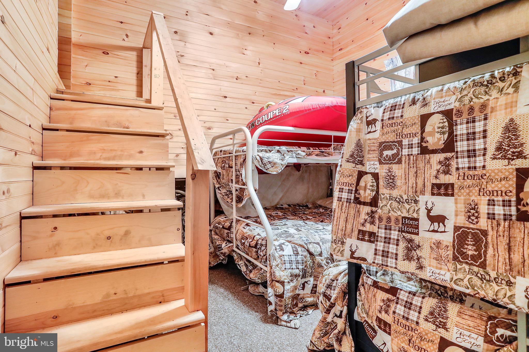 25-20 Rocky Road Falling Waters, WV 25419 - Photo 9 of 25 a view of walk in closet with clothes and shoes