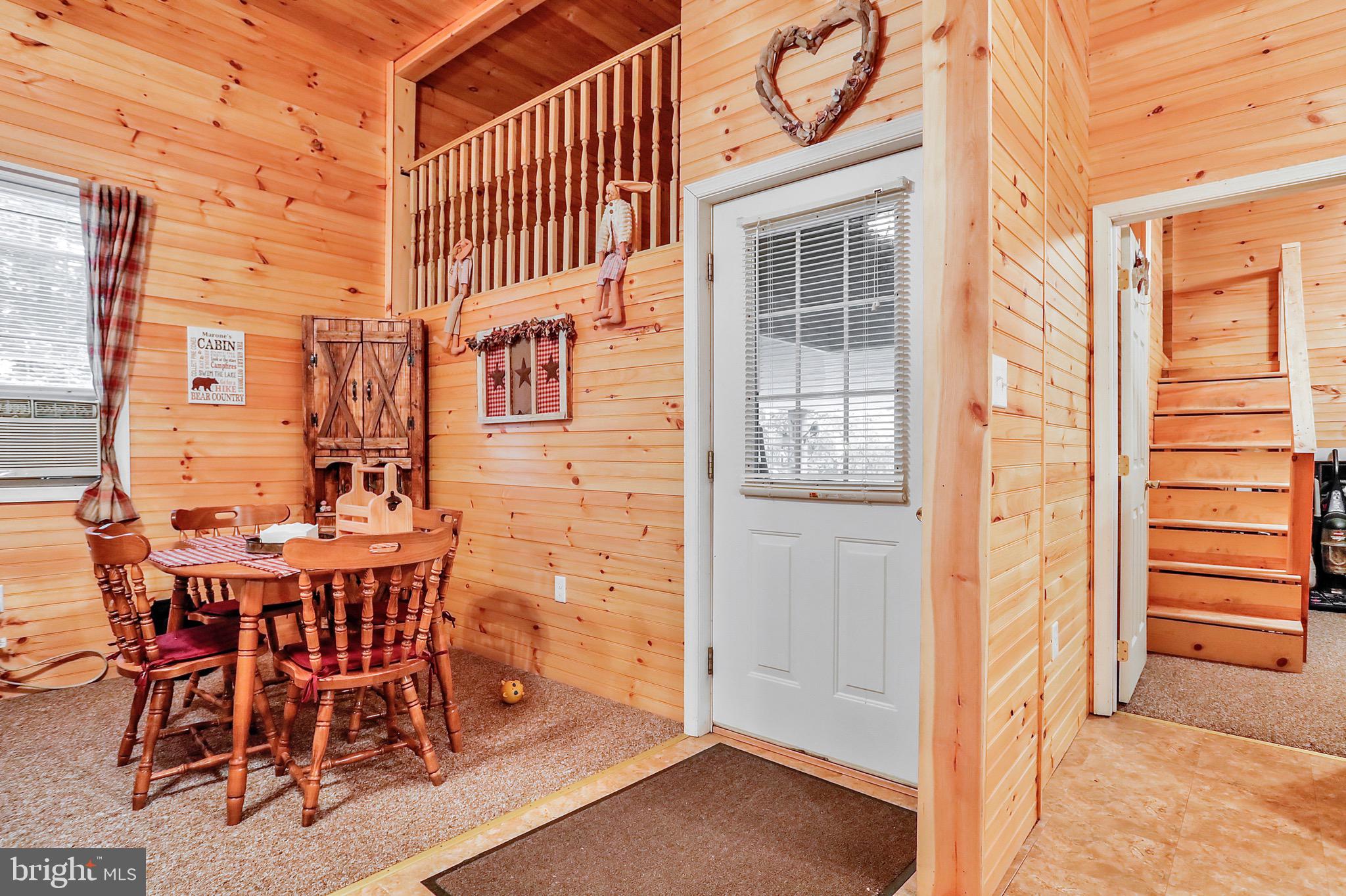 25-20 Rocky Road Falling Waters, WV 25419 - Photo 10 of 25 a view of a dining room with furniture and a window