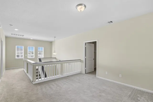 a view of an entryway with white walls
