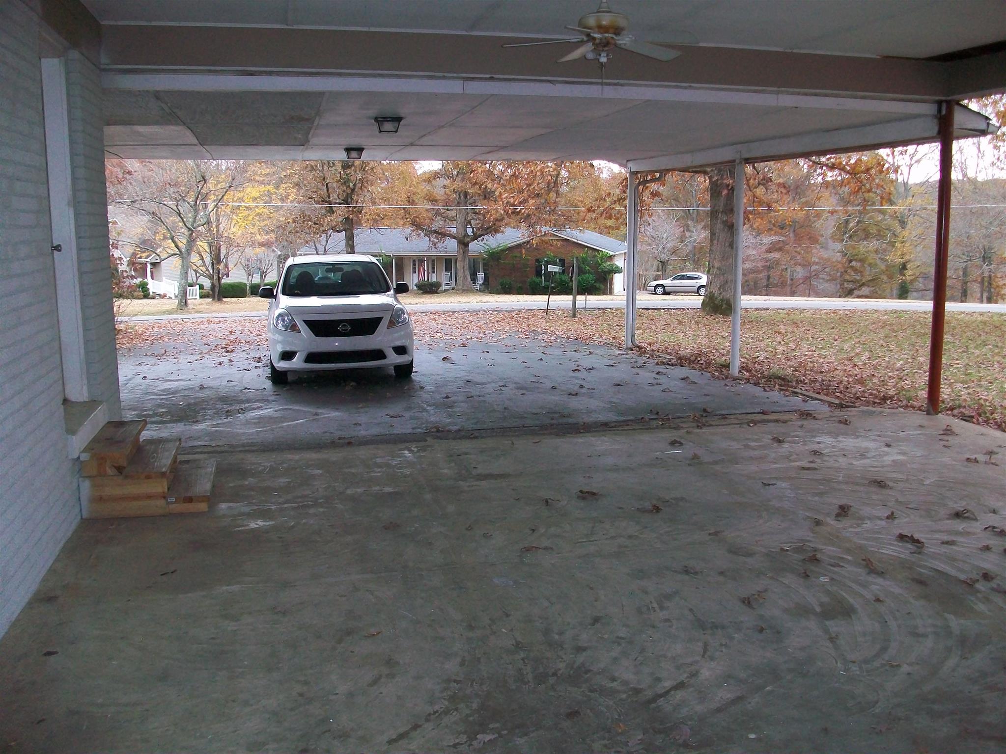 203 Rouse Road Dickson, TN 37055 - Photo 22 of 29 Enormous covered space that begs to be closed in and included as den or man cave.