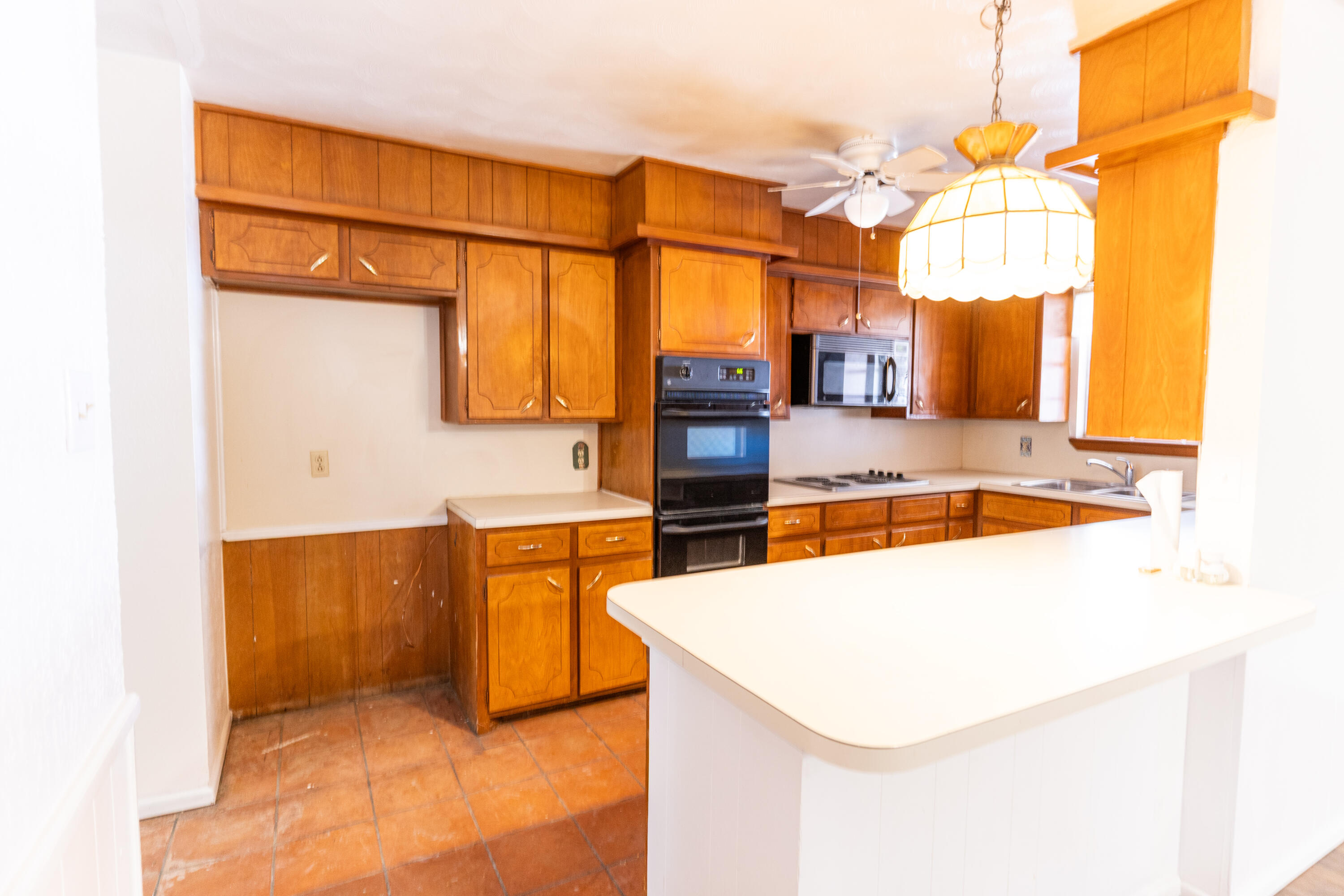 5314 46th Street Lubbock, TX 79414 - Photo 3 of 15 a kitchen with stainless steel appliances granite countertop a sink and a refrigerator