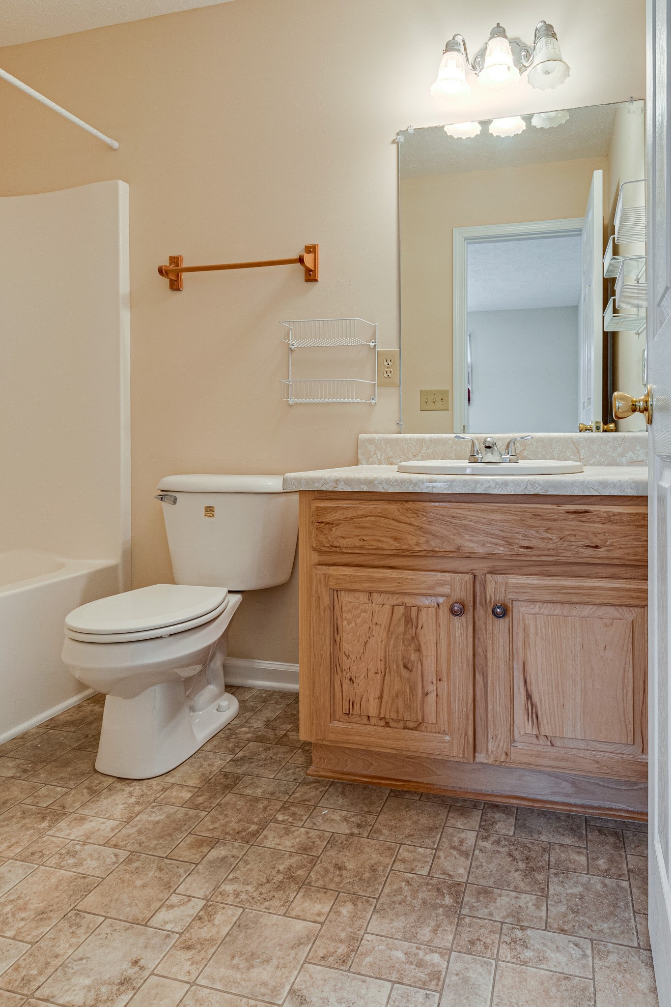 188 Zachary Road Lebanon, TN 37090 - Photo 15 of 29 a spacious bathroom with a toilet a sink and mirror