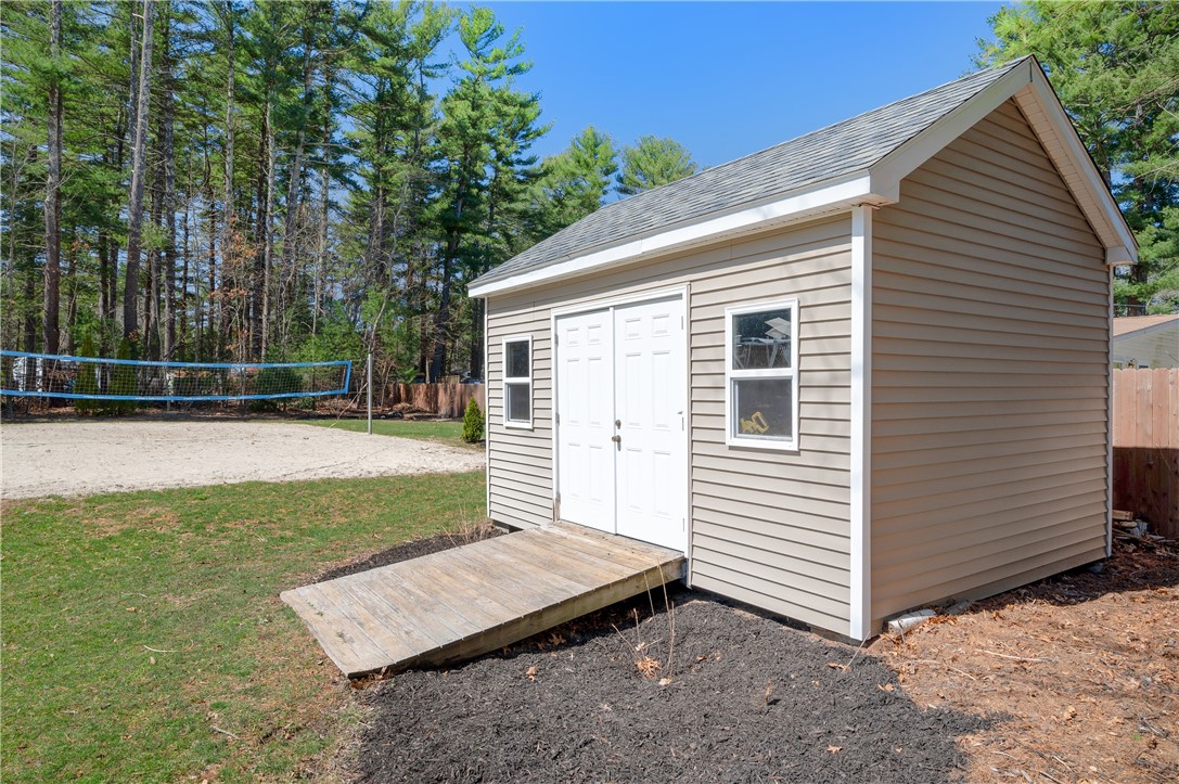 204 Shady Valley Road Coventry, RI 02816 - Photo 31 of 48 Shed and beach volleyball court