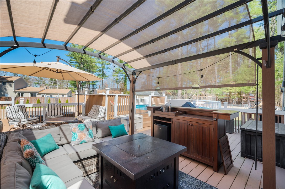204 Shady Valley Road Coventry, RI 02816 - Photo 39 of 48 Back deck off office with bar area