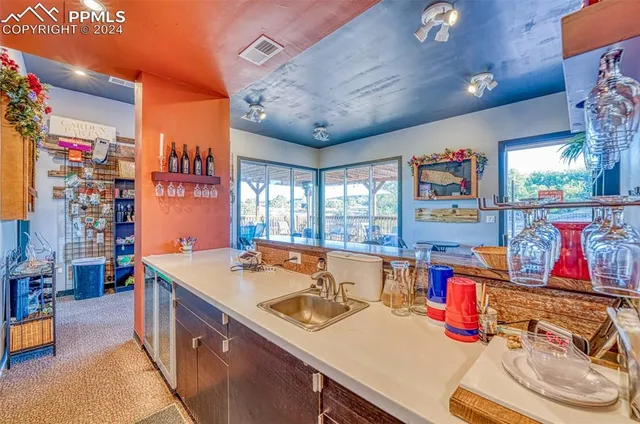 a reading room with lots of furniture and toys