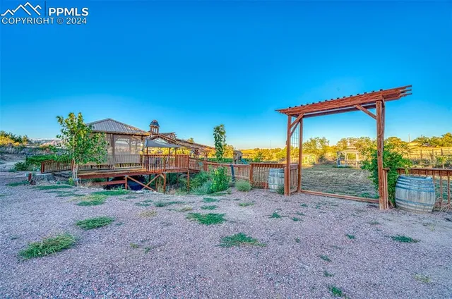 a bedroom with a bed and a table in it