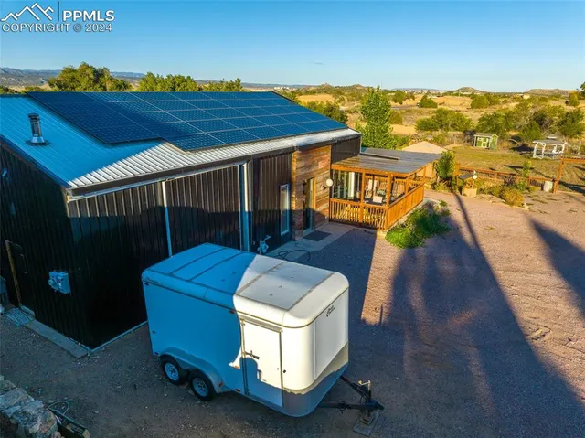 a view of a swimming pool with lounge chair