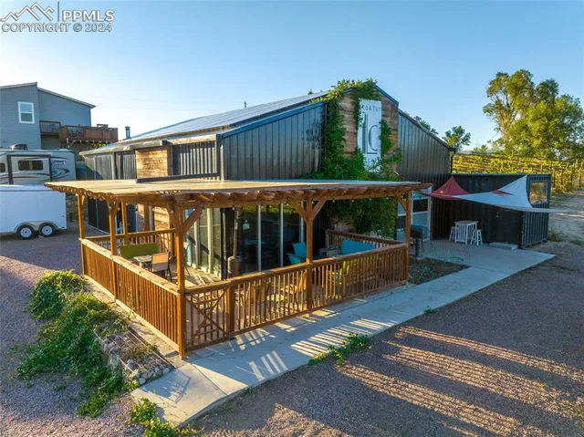 an aerial view of residential building and ocean