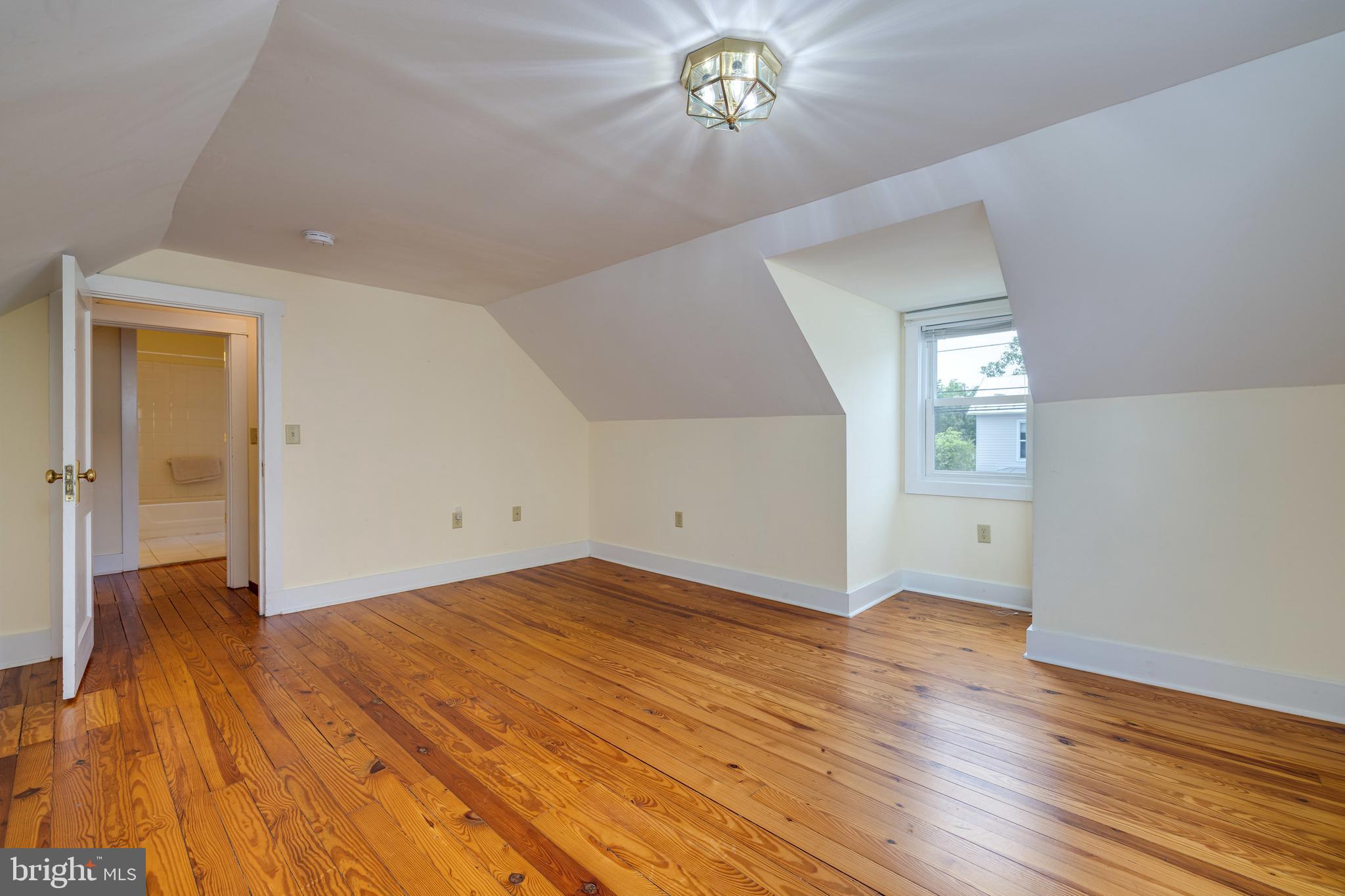 220 Mechanic Street Luray, VA 22835 - Photo 29 of 45 wooden floor in an empty room with a window