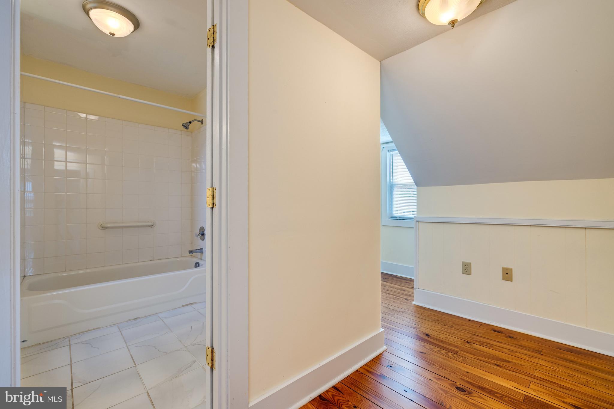 220 Mechanic Street Luray, VA 22835 - Photo 31 of 45 a bathroom with a bathtub and shower