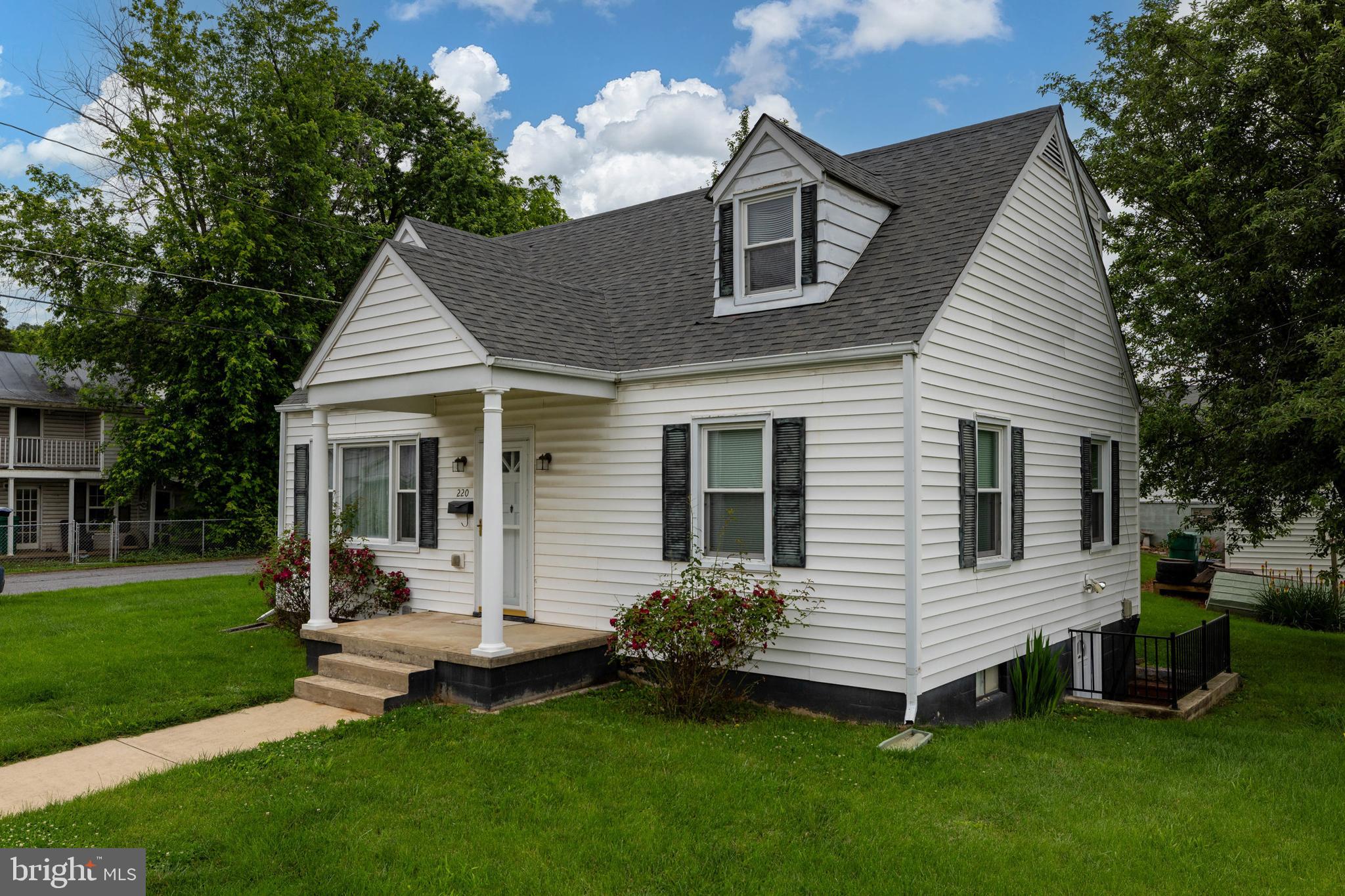 220 Mechanic Street Luray, VA 22835 - Photo 40 of 45 a view of a house with a yard and sitting area