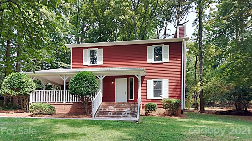 1606 Willowbrook Drive Fort Mill, SC 29708 - Photo 1 of 12 front view of a house with a yard