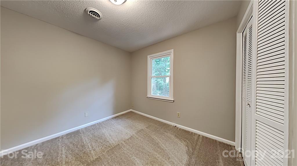 1606 Willowbrook Drive Fort Mill, SC 29708 - Photo 9 of 12 an empty room with a window