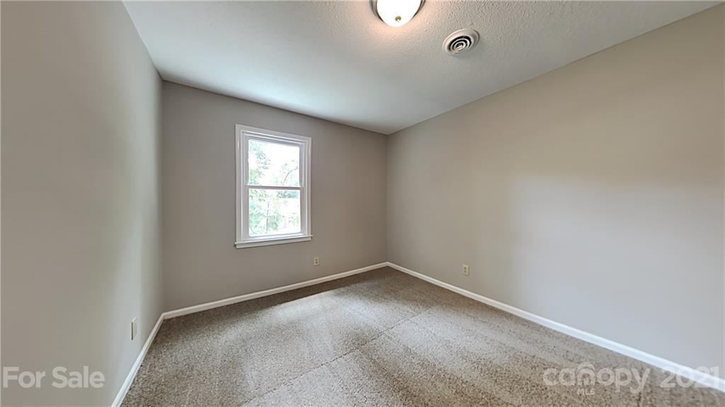 1606 Willowbrook Drive Fort Mill, SC 29708 - Photo 10 of 12 an empty room with a window