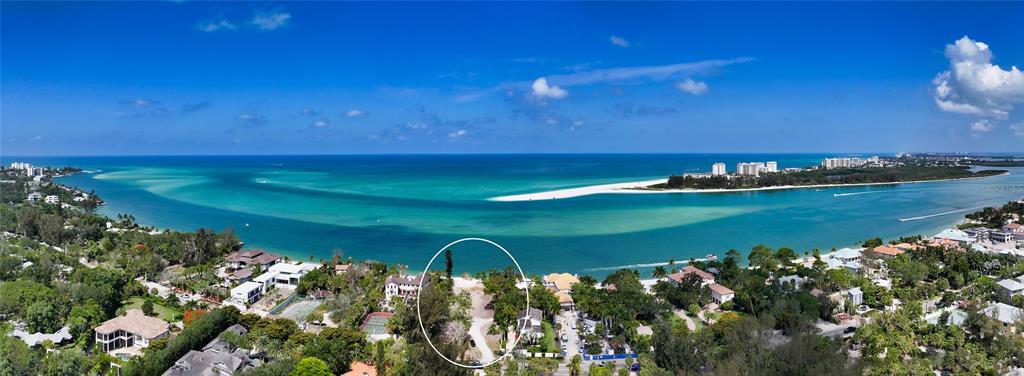 4105 North Shell Road Sarasota, FL 34242 - Photo 11 of 26 a view of a swimming pool with an outdoor space and seating area