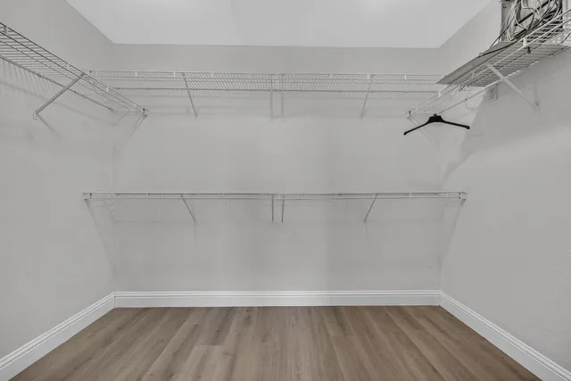 a view of a room with racks on the wall