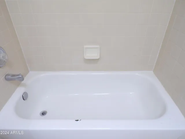 a bathroom with a bathtub