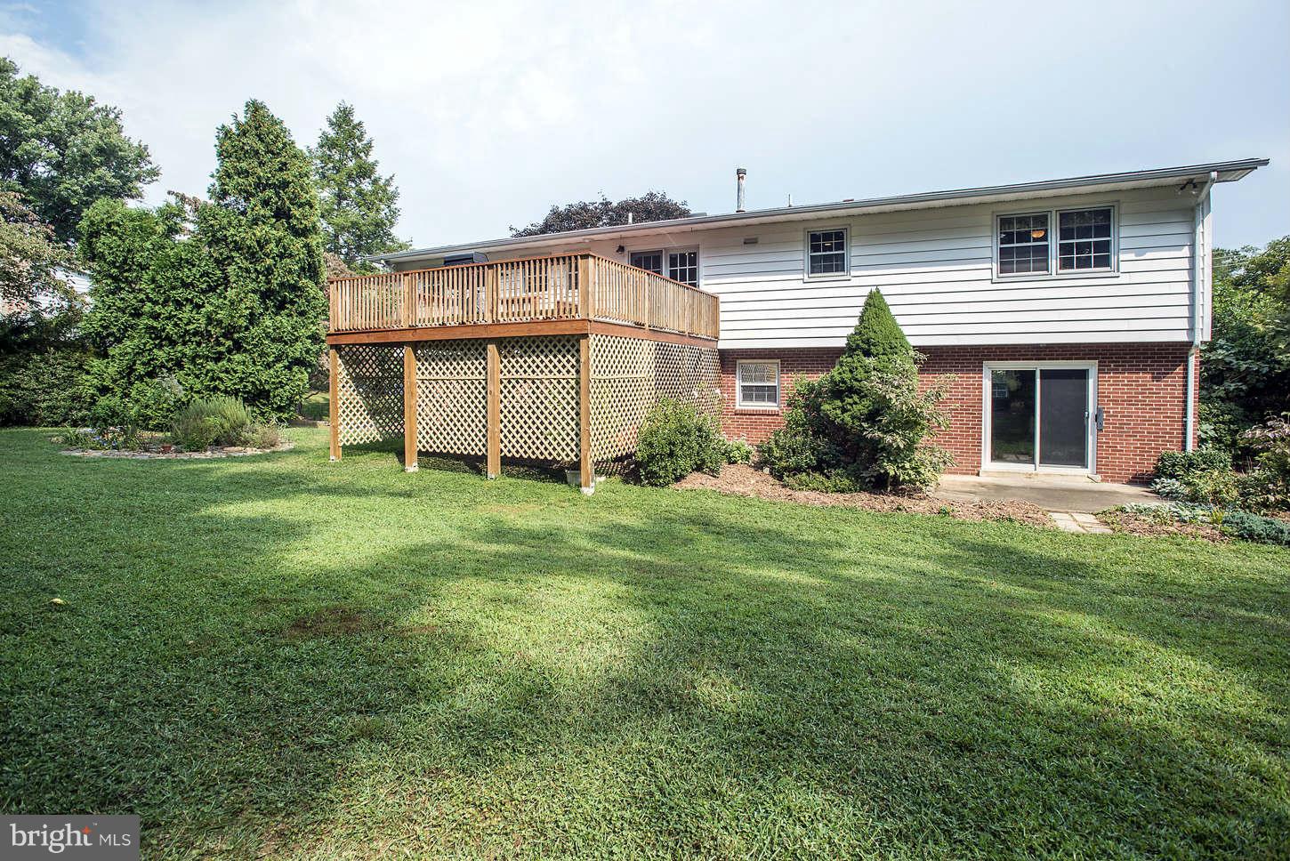 14704 Notley Road Silver Spring, MD 20905 - Photo 28 of 30 Level Yard & Deck with Walk-Out to Patio