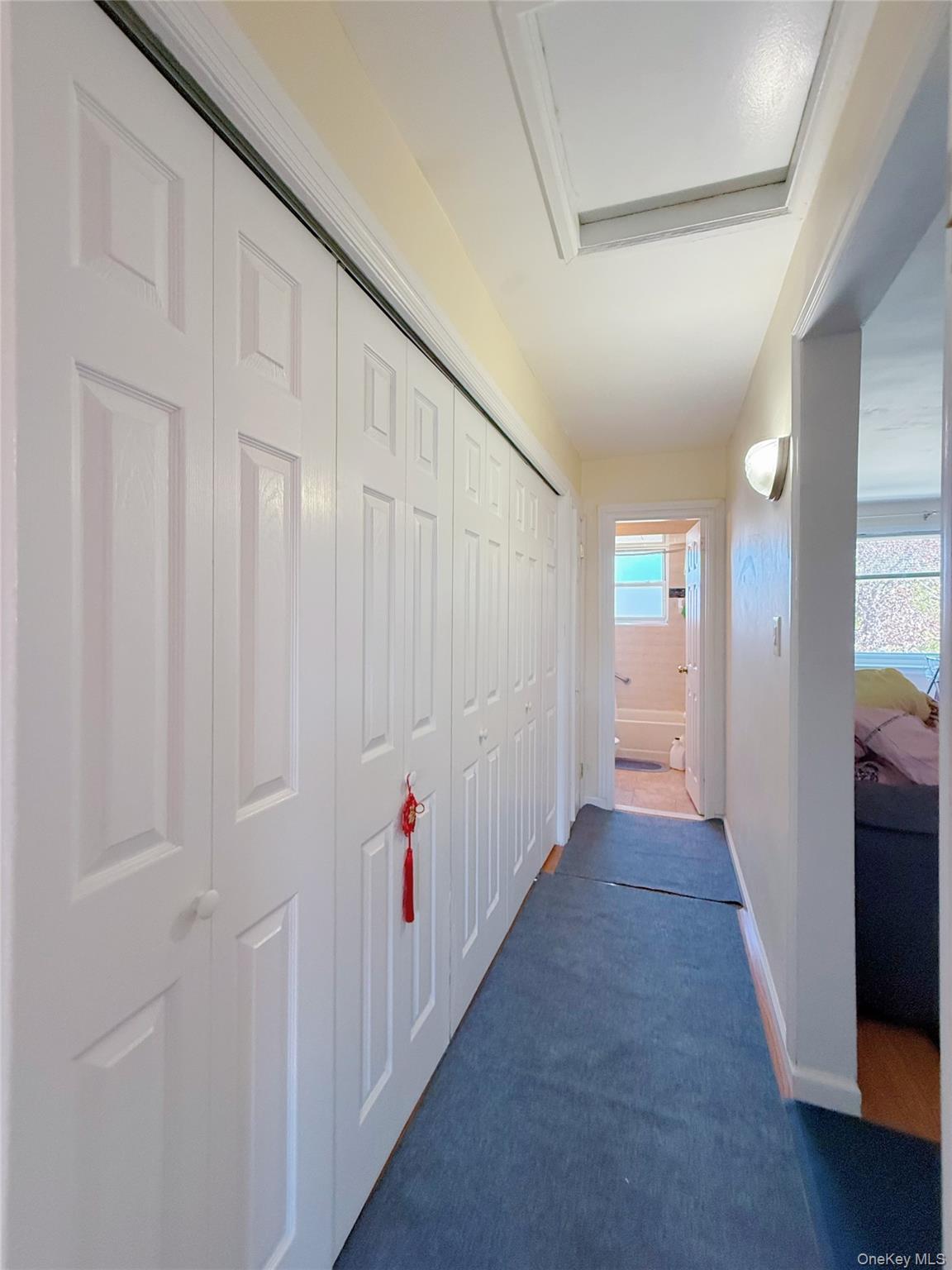 152-47 Jewel Avenue, Unit 159B Queens, NY 11367 - Photo 6 of 11 wooden floor in an empty room