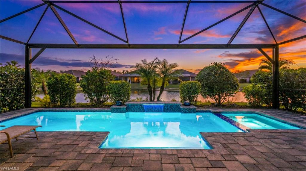 15216 Turin Drive Naples, FL 34114 - Photo 1 of 50 pool light and sunset digitally enhanced