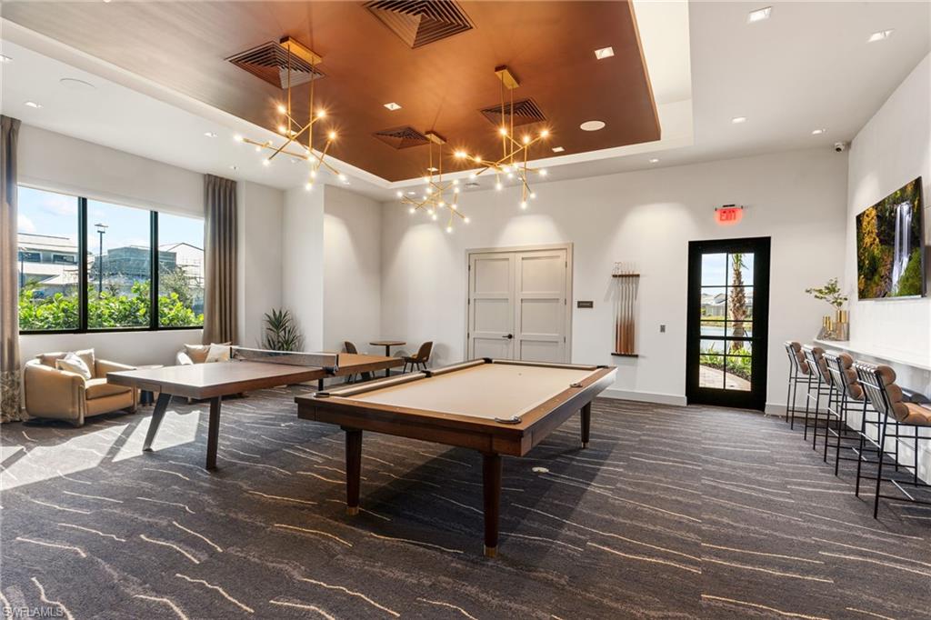 15216 Turin Drive Naples, FL 34114 - Photo 45 of 50 Playroom featuring billiards, a tray ceiling, and recessed lighting
