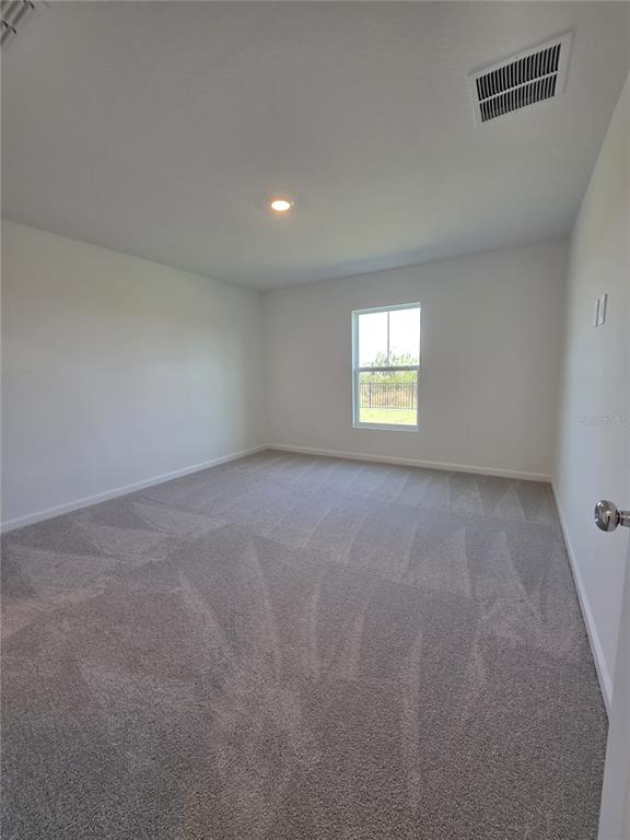 3484 Chinotto Drive Lake Alfred, FL 33850 - Photo 15 of 32 a view of an empty room with a window
