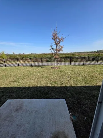 a view of a swimming pool with an ocean view