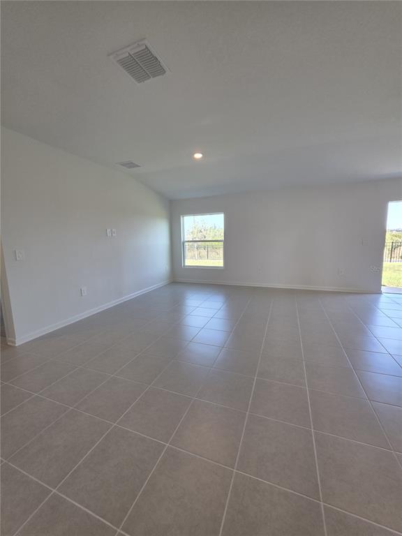 3484 Chinotto Drive Lake Alfred, FL 33850 - Photo 7 of 32 a view of an empty room and window