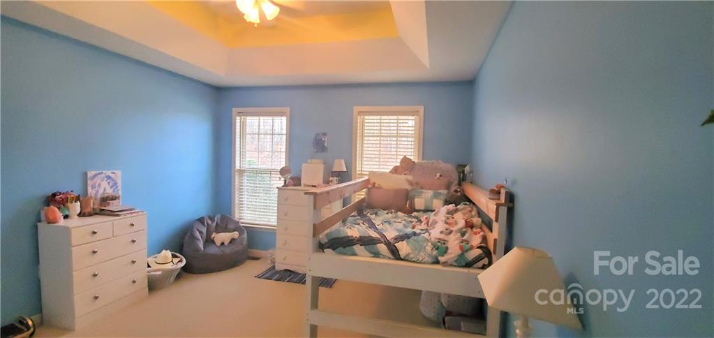 1820 Daisy Couch Road Heath Springs, SC 29058 - Photo 11 of 21 a bed room with a bed and a couch