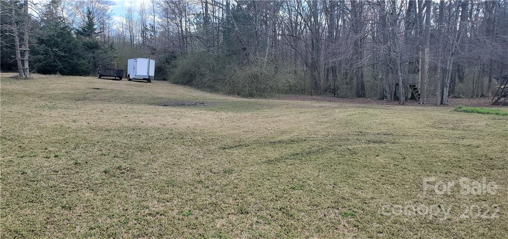 1820 Daisy Couch Road Heath Springs, SC 29058 - Photo 20 of 21 a view of a backyard with large trees