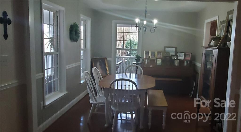 1820 Daisy Couch Road Heath Springs, SC 29058 - Photo 3 of 21 a view of a dining room with furniture and chandelier