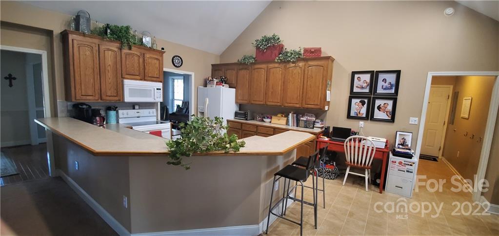 1820 Daisy Couch Road Heath Springs, SC 29058 - Photo 5 of 21 a view of a dining room with furniture window and wooden floor